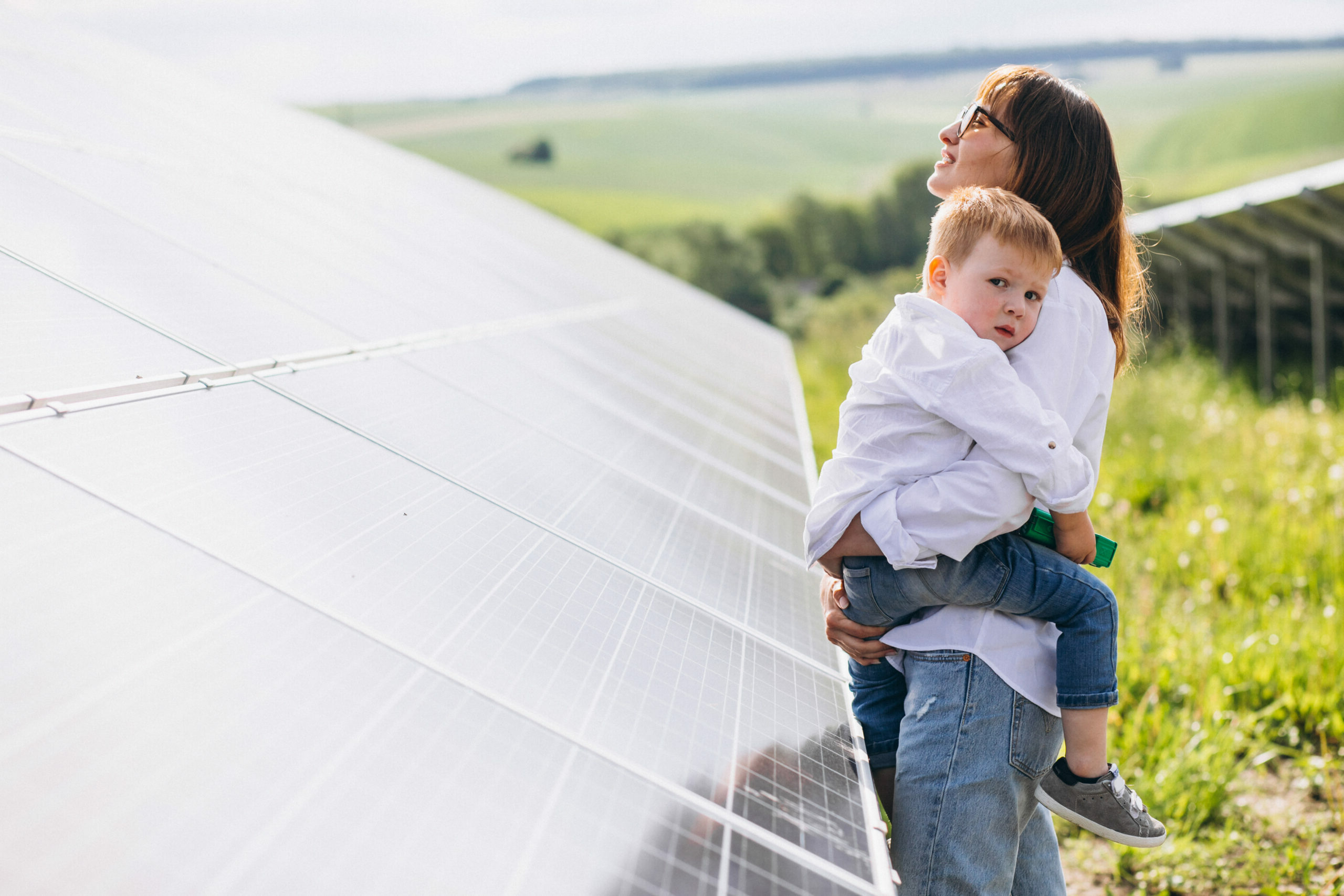 Mother,With,Her,Little,Son,By,Solar,Panels
